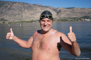 Paul Duffield at Gyro Park in Osoyoos after successfully completing the swim. (photo credit: Angelique Duffield)
